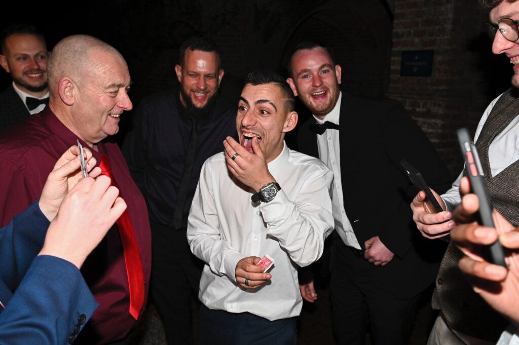 Corporate magician performing close-up magic at a business event in Orpington.